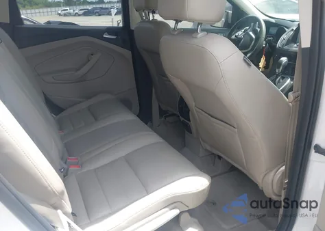 2014 Ford Escape Titanium z USA, uszkodzony, nr VIN 1FMCU0J91EUA81925